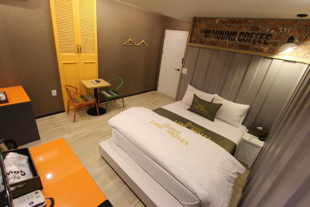 Postel nebo postele na pokoji v ubytování Line Motel