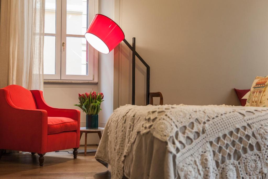Posteľ alebo postele v izbe v ubytovaní Casa Fabbrini Fancy Suites