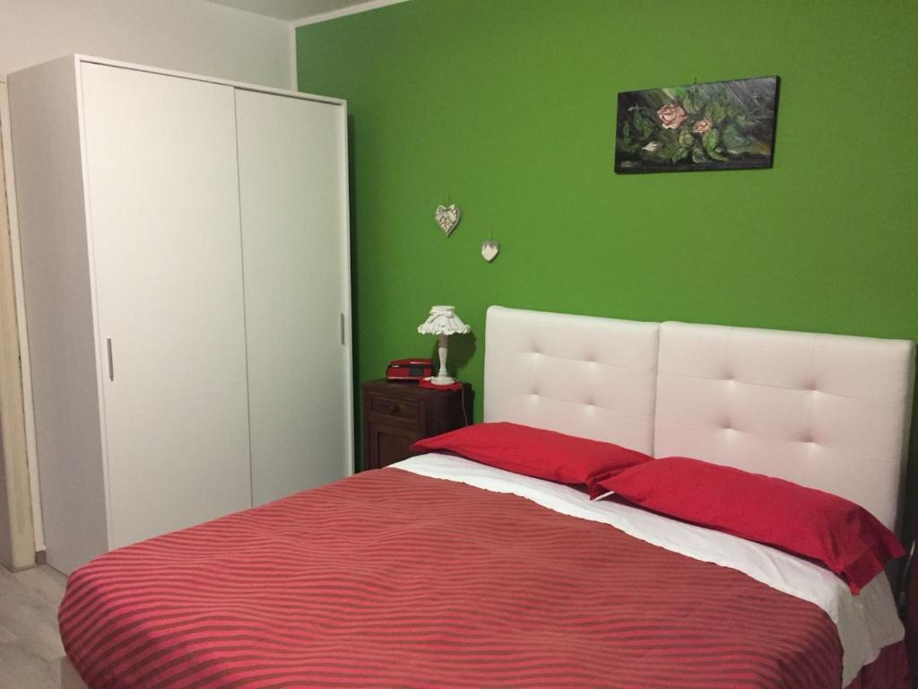 Voodi või voodid majutusasutuse Hotel Carrara toas