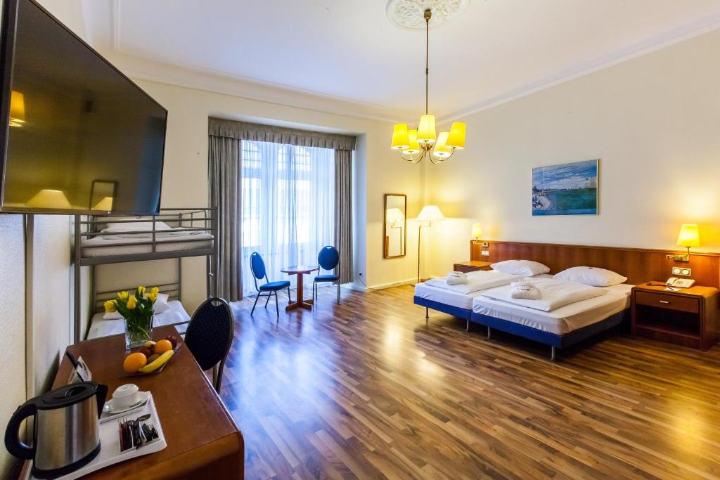 
Quadruple Room - Minibar drinks free of charge
