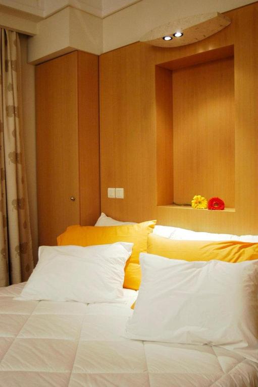 Postel nebo postele na pokoji v ubytování Central Hotel