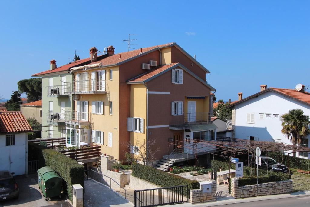 a row of houses in a residential neighborhood at Rooms and Apartments Robert in Rovinj