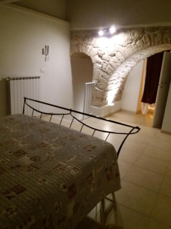 Postel nebo postele na pokoji v ubytování Pietra Bianca
