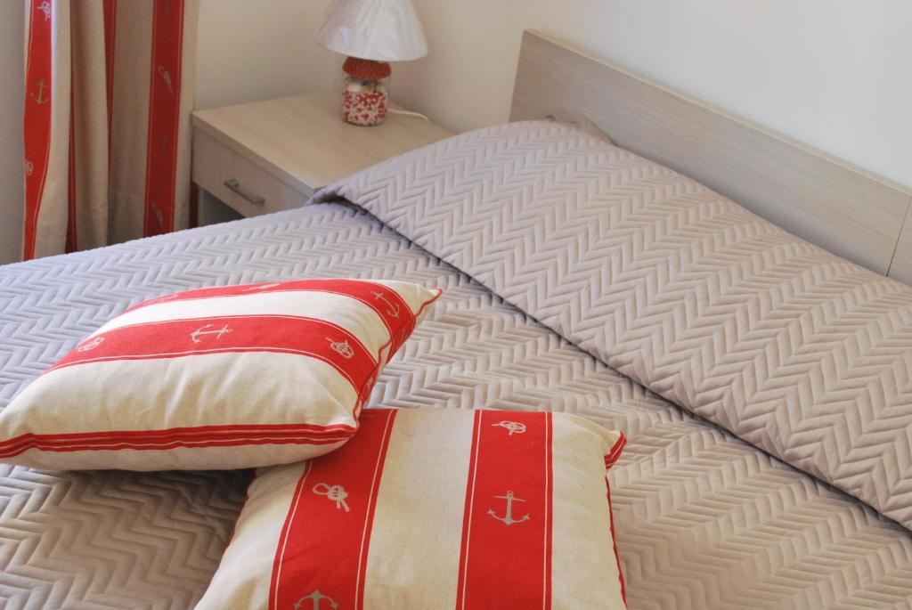 Postel nebo postele na pokoji v ubytování B&B Mare e Templi