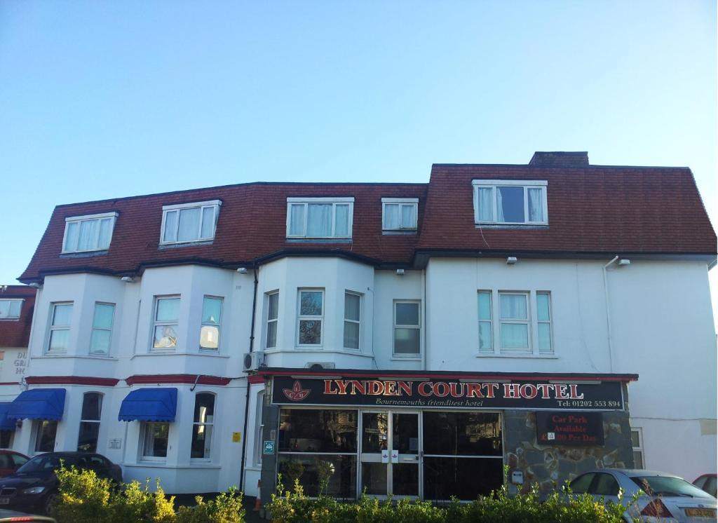a large building with a large window on the side of it at Lynden Court Hotel in Bournemouth