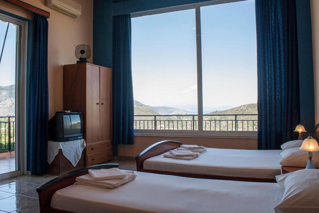 Postel nebo postele na pokoji v ubytování Calypso Apartments