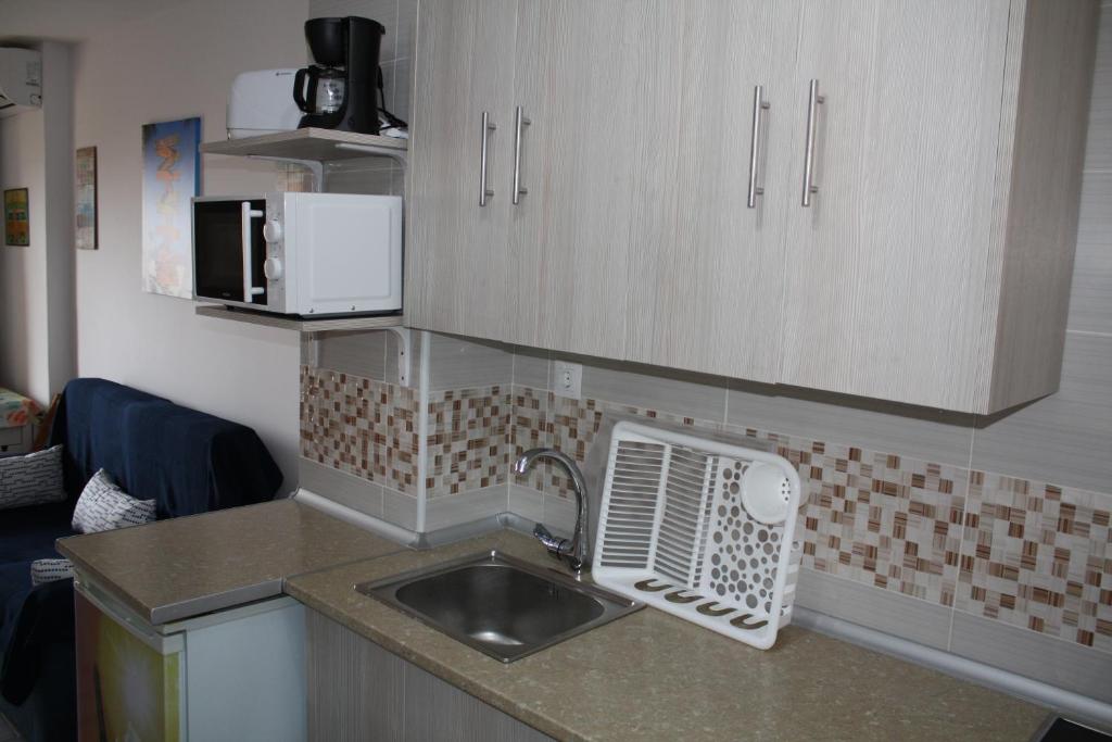 Kuchyň nebo kuchyňský kout v ubytování Benalmadena Aguila apartment wonderful views