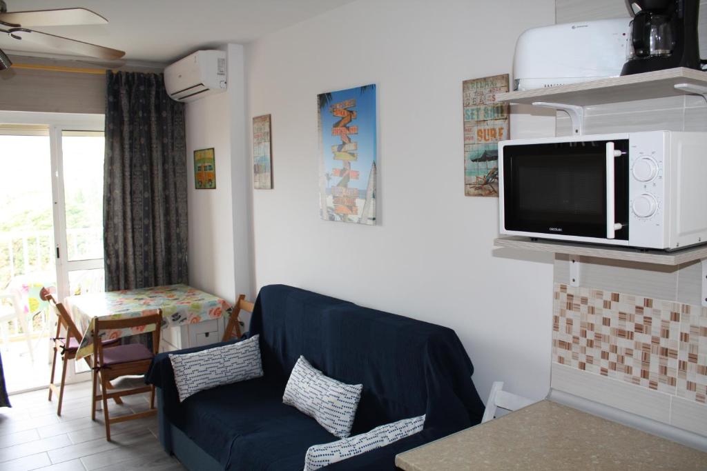 TV a/nebo společenská místnost v ubytování Benalmadena Aguila apartment wonderful views