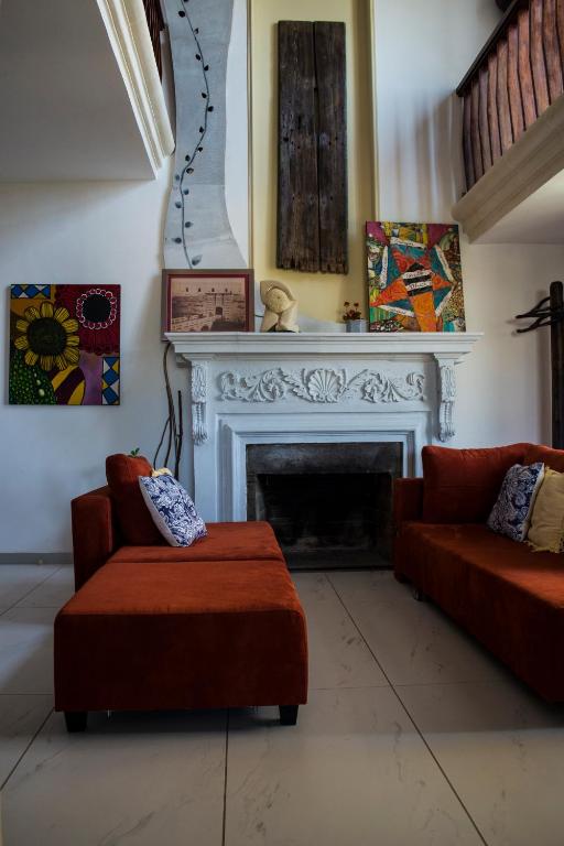 Posezení v ubytování Luxury apartment - Fort Chambray
