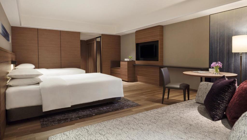 Postel nebo postele na pokoji v ubytování Nanki-Shirahama Marriott Hotel