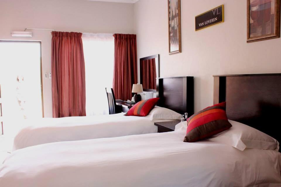 Katil atau katil-katil dalam bilik di The Lazy Grape Guest Lodge & Spa