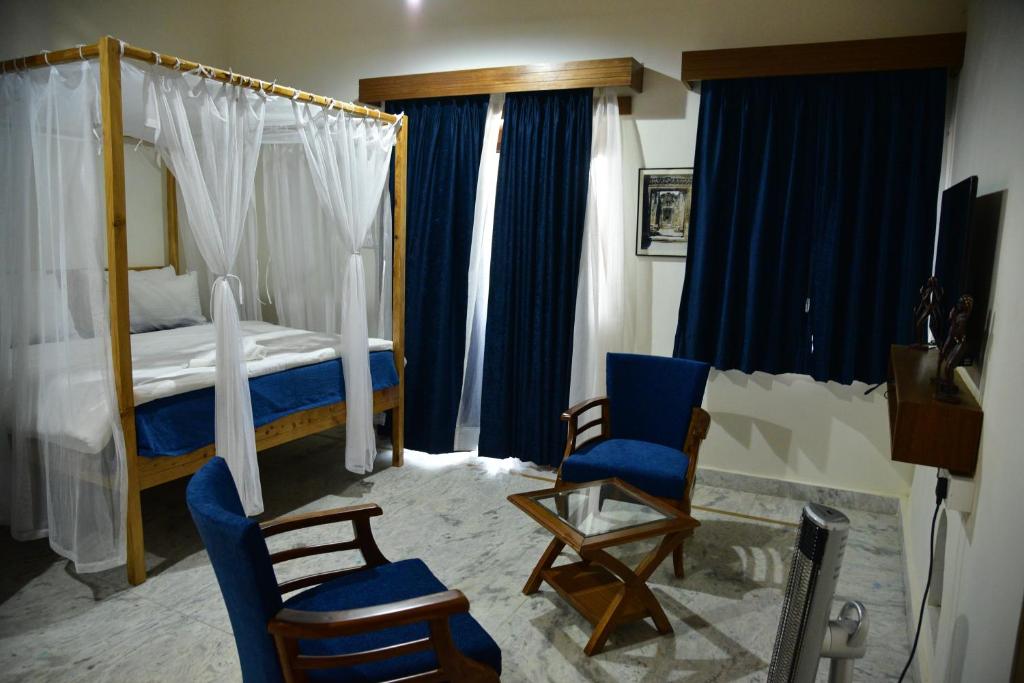 Postel nebo postele na pokoji v ubytování Deodar Homestay