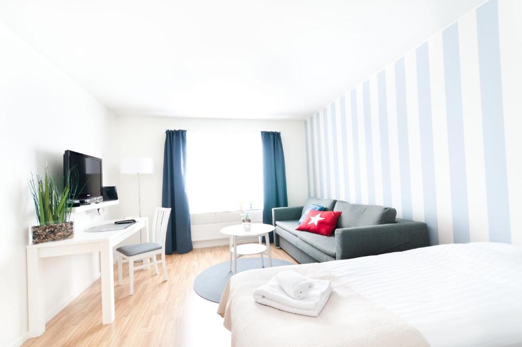 Postel nebo postele na pokoji v ubytování Attendo Park Hotell