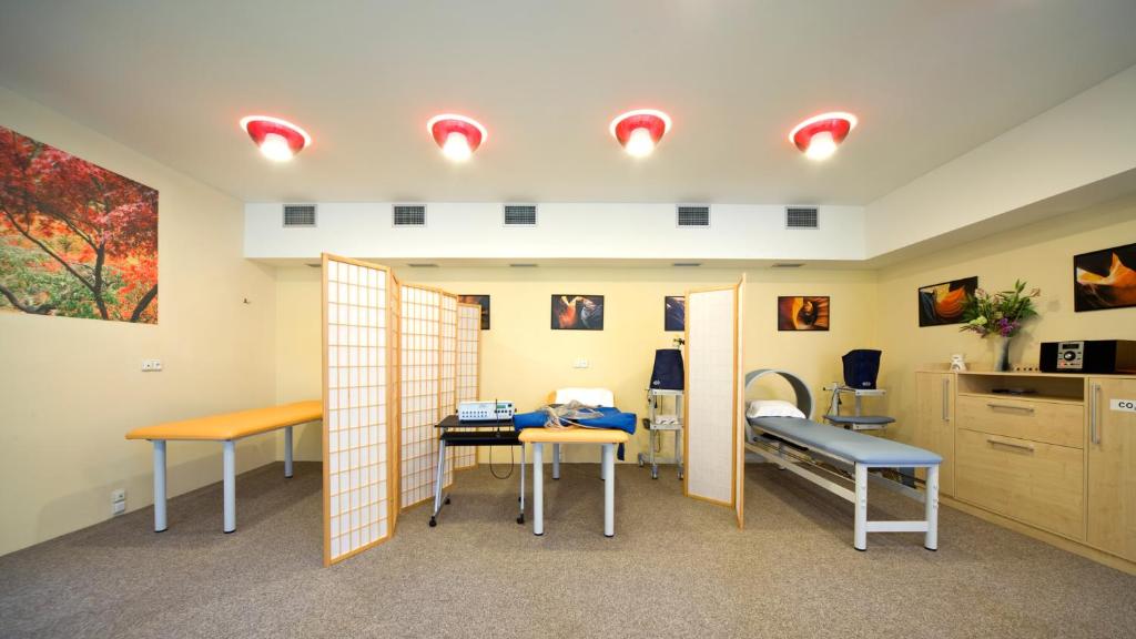 TV a/nebo společenská místnost v ubytování Spa & Wellness Hotel St. Moritz