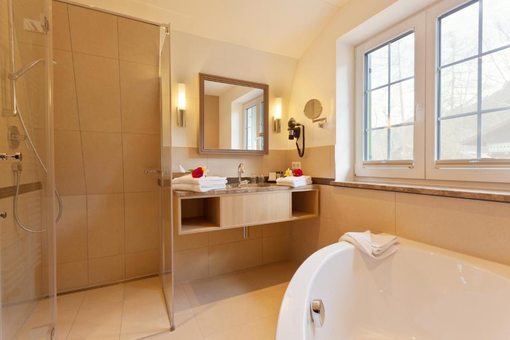Koupelna v ubytování Villa Ludwig Suite Hotel