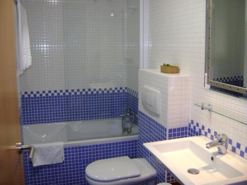 Koupelna v ubytování Aparthotel Arenal