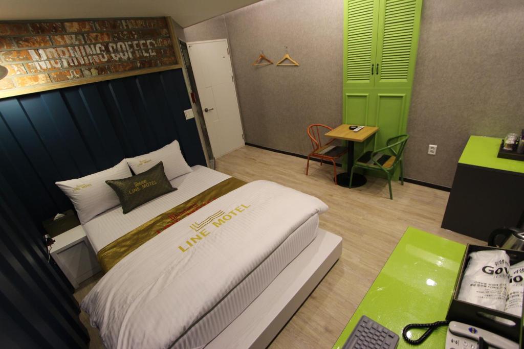 Postel nebo postele na pokoji v ubytování Line Motel
