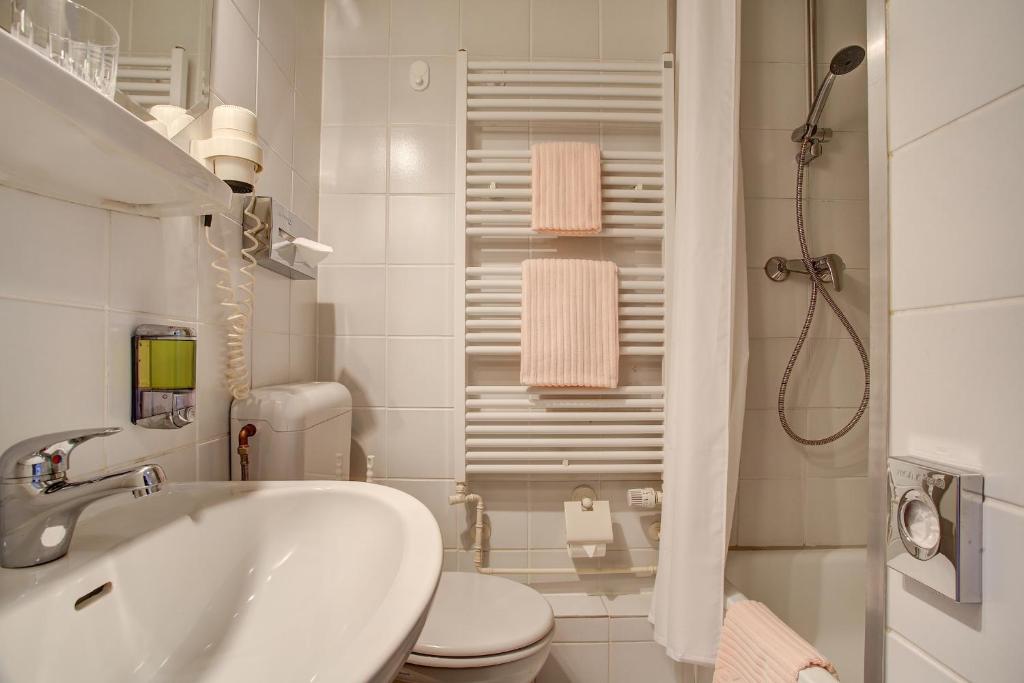 Koupelna v ubytování INA Hotel Consul