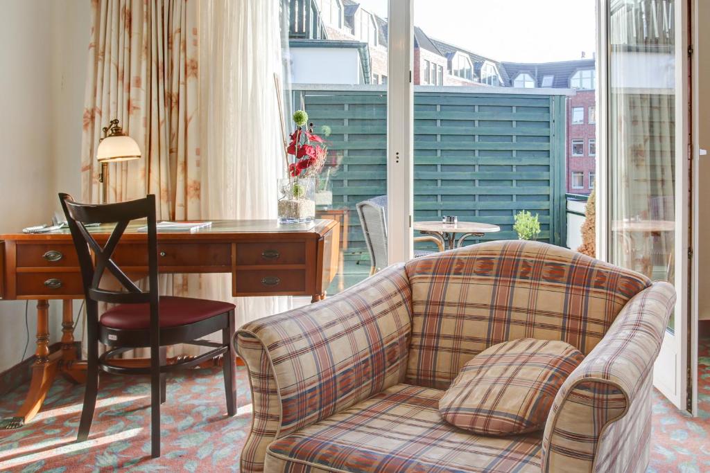 Posezení v ubytování INA Hotel Consul