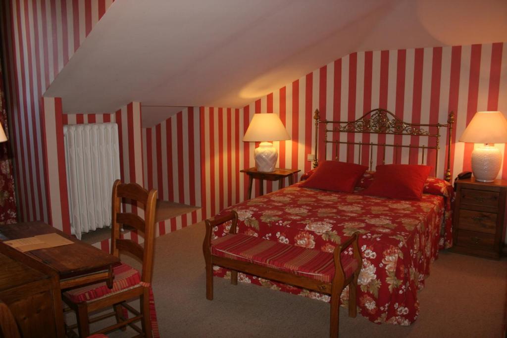 Postel nebo postele na pokoji v ubytování La Posada de Don Mariano