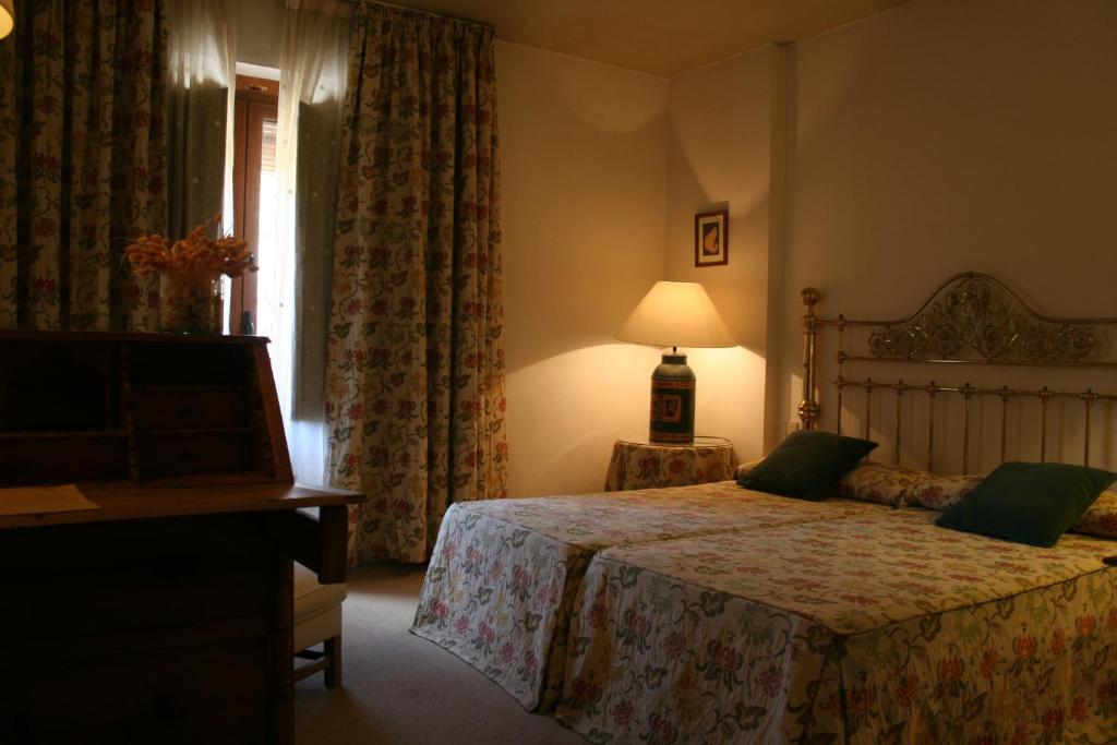 Postel nebo postele na pokoji v ubytování La Posada de Don Mariano