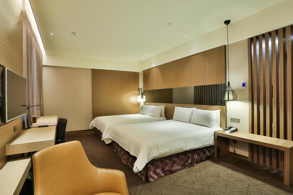 Postel nebo postele na pokoji v ubytování Hotel Intrendy