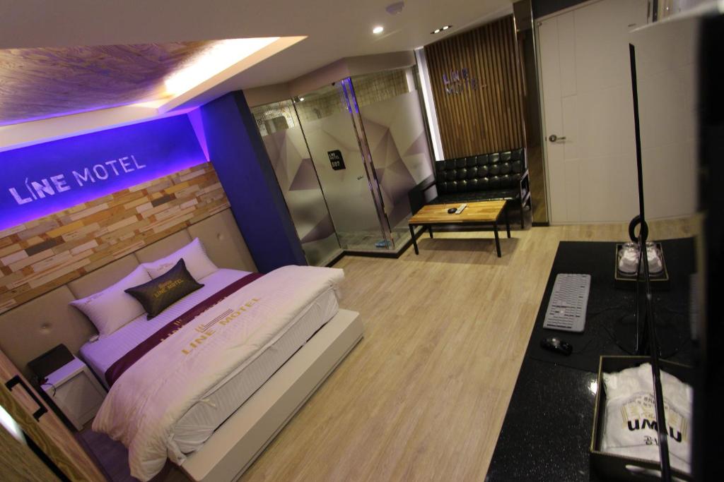 Postel nebo postele na pokoji v ubytování Line Motel