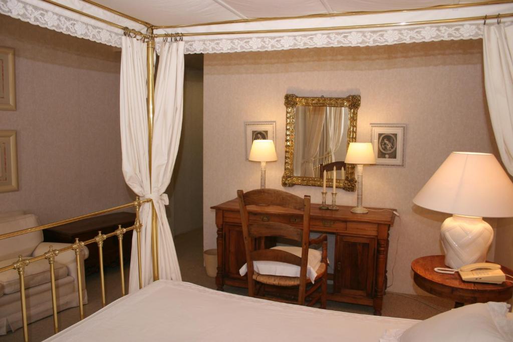 Postel nebo postele na pokoji v ubytování La Posada de Don Mariano