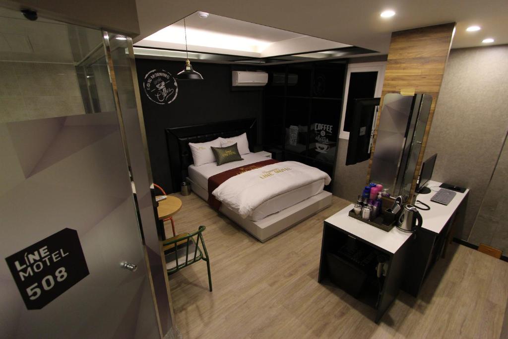 Postel nebo postele na pokoji v ubytování Line Motel