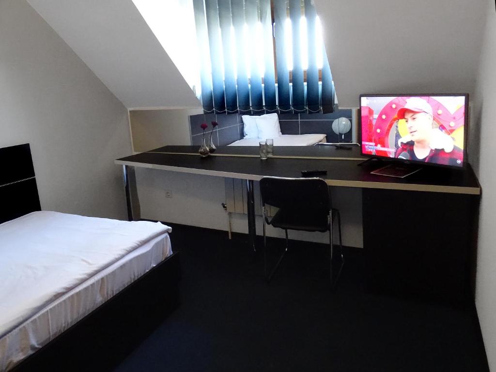 TV a/nebo společenská místnost v ubytování Prince Hotel
