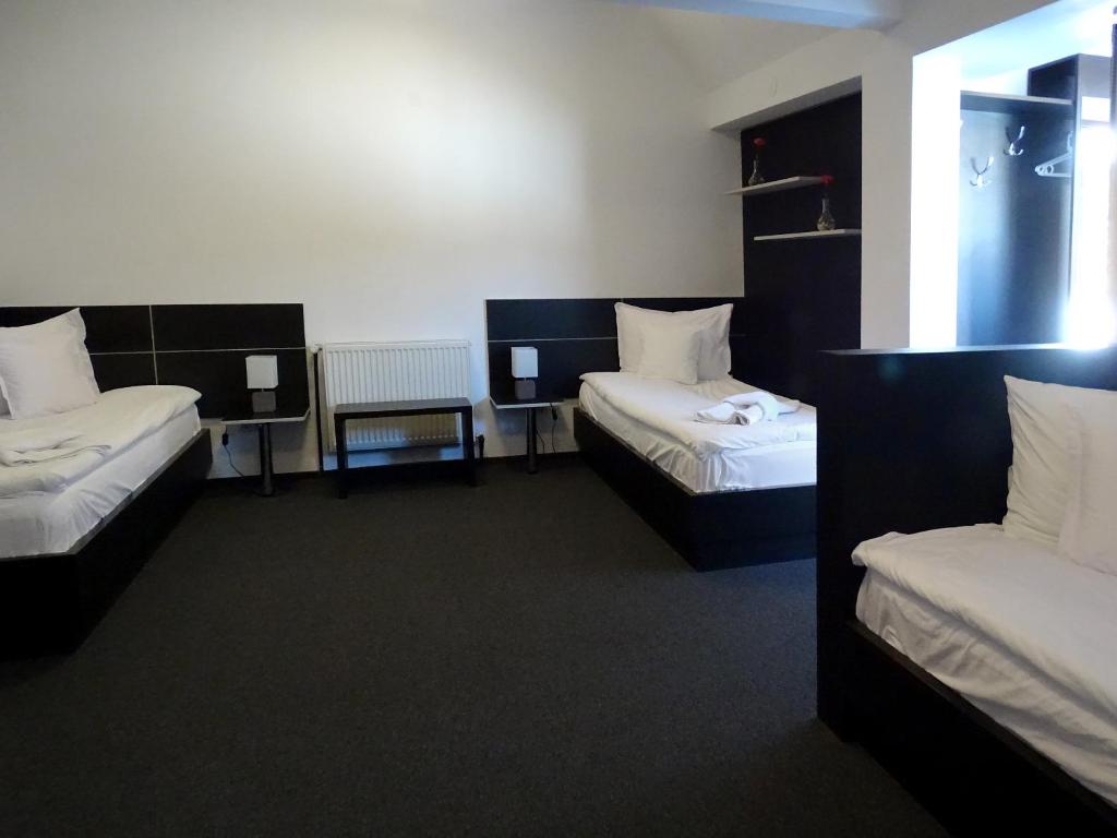 Postel nebo postele na pokoji v ubytování Prince Hotel
