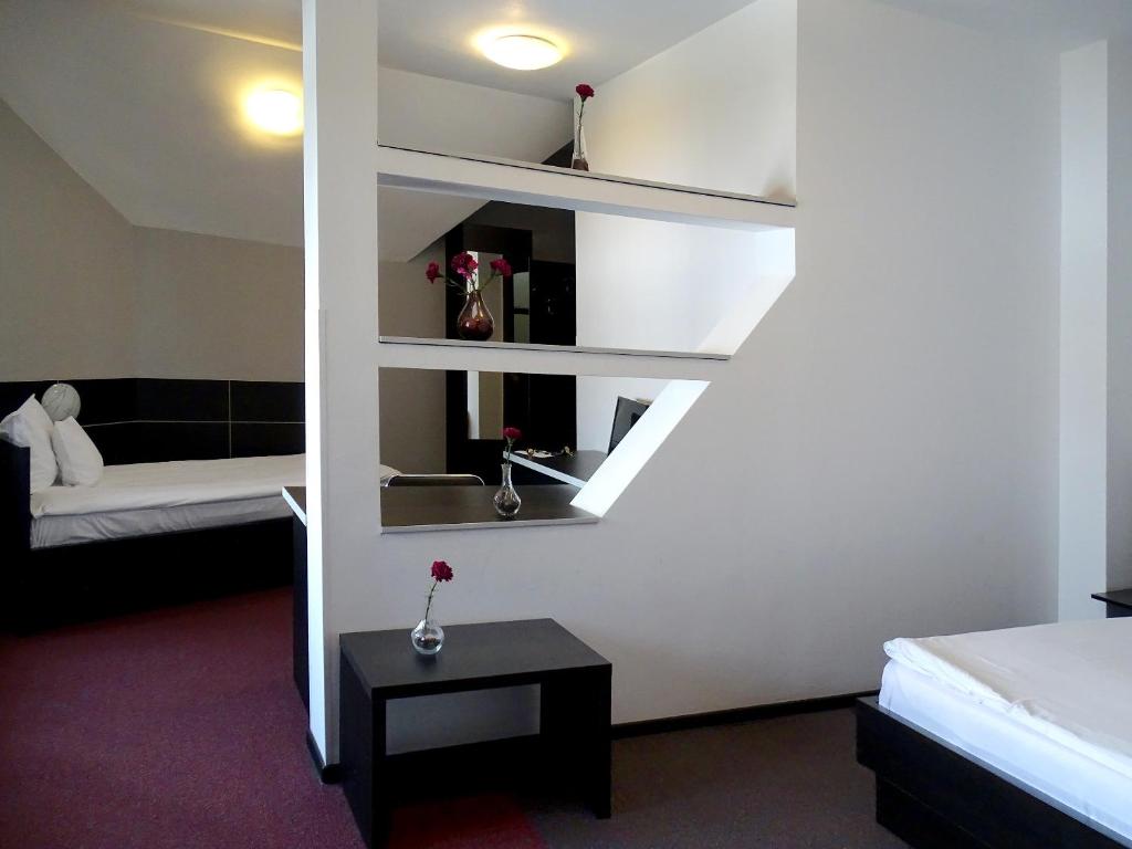 Postel nebo postele na pokoji v ubytování Prince Hotel