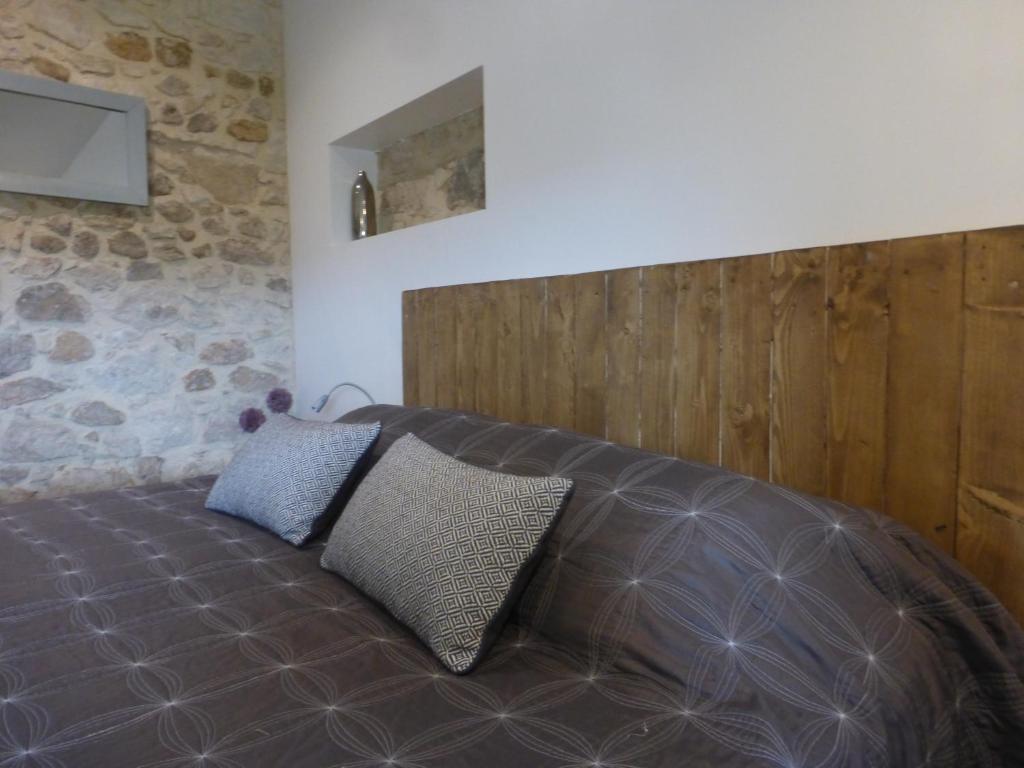Postel nebo postele na pokoji v ubytování Le Mas des Monèdes