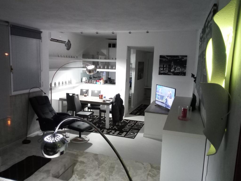 TV a/nebo společenská místnost v ubytování bianco relax