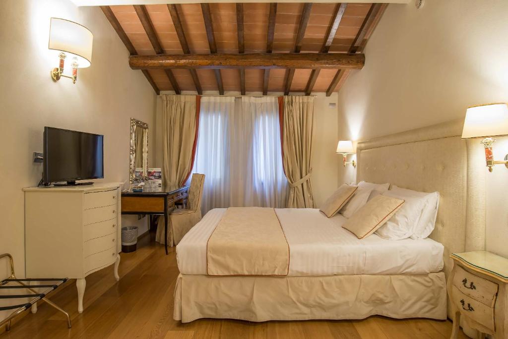 Postel nebo postele na pokoji v ubytování Hotel Atlantic Palace