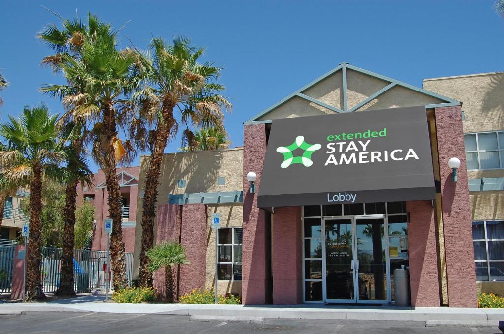a large building with a sign on the front of it at Extended Stay America Suites - Las Vegas - Valley View in Las Vegas