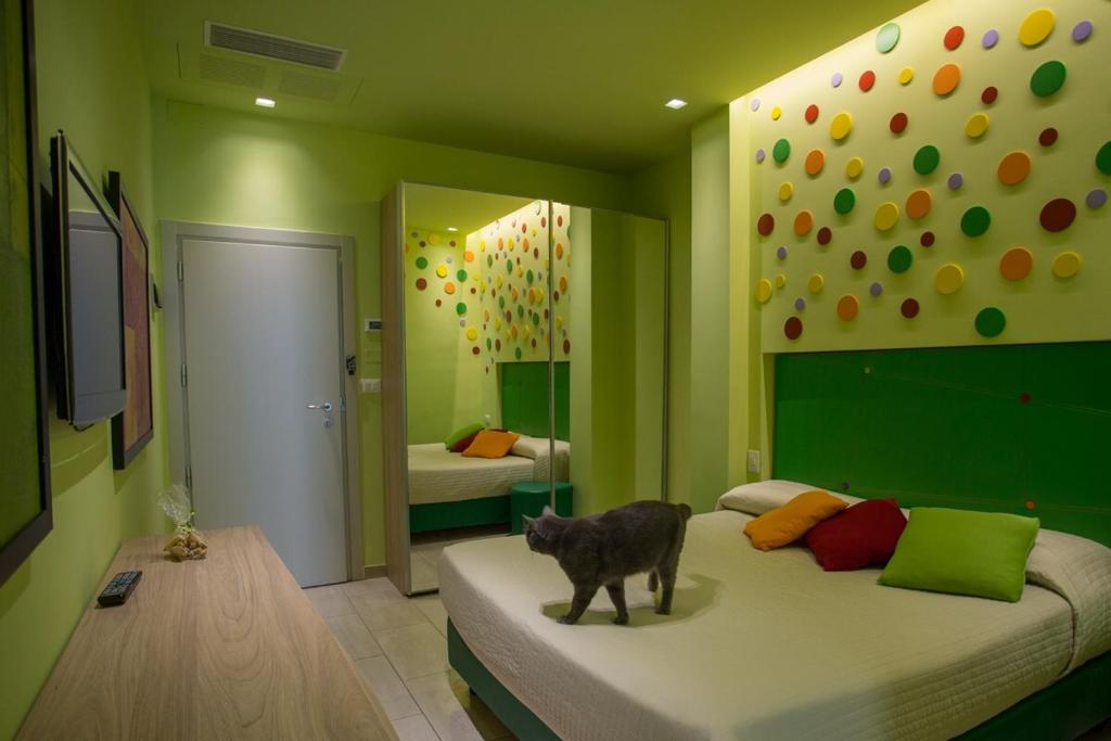 Postel nebo postele na pokoji v ubytování Hotel Principe