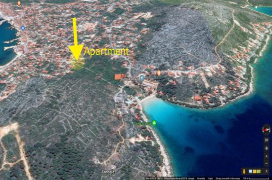 a map of an island with a yellow arrow at Slanica studio ID 816 by HeartofDalmatia in Murter