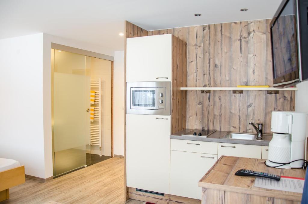 Kuchyň nebo kuchyňský kout v ubytování Ferienhaus Waldner