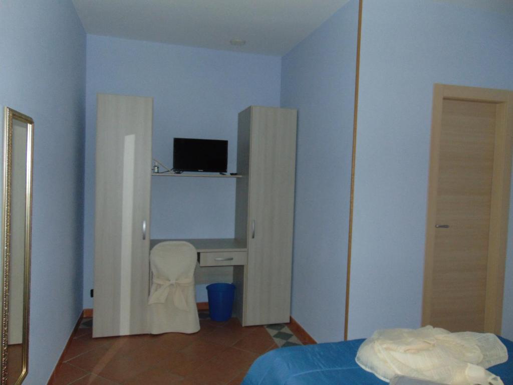 Televízia a/alebo spoločenská miestnosť v ubytovaní Agriturismo CHERUBINI DANIELA