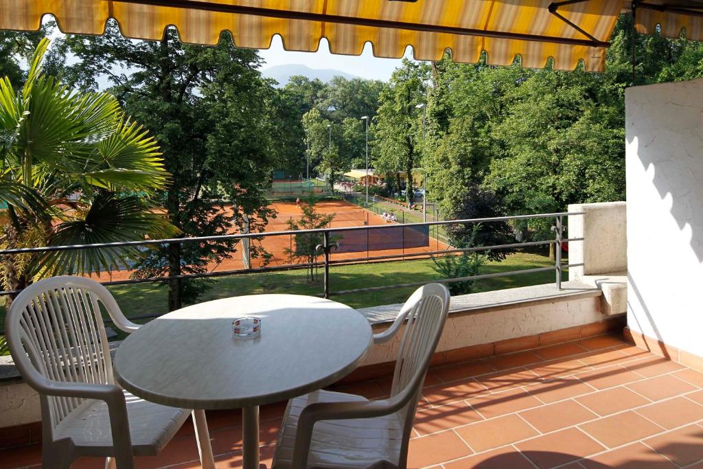 Balkón nebo terasa v ubytování Aparthotel Al Lago