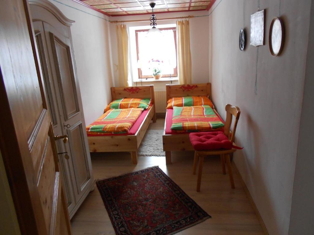 Postel nebo postele na pokoji v ubytování La vecchia Mesnerhaus