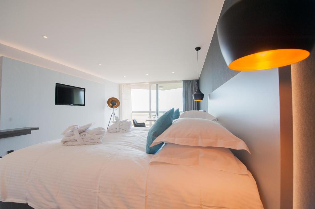 Postel nebo postele na pokoji v ubytování C-Hotels Andromeda