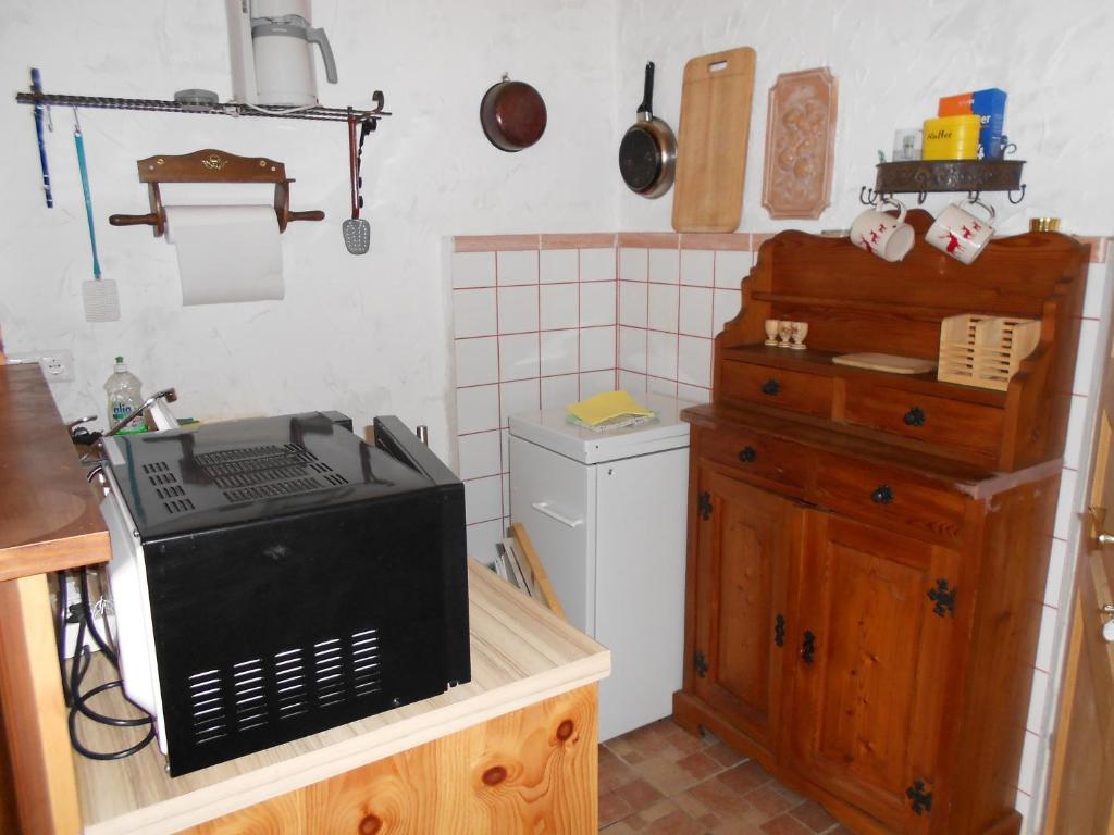 Kuchyň nebo kuchyňský kout v ubytování La vecchia Mesnerhaus