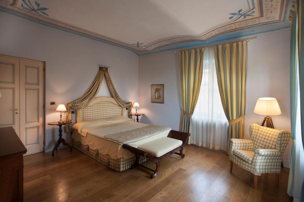 Postel nebo postele na pokoji v ubytování Villa Tiboldi