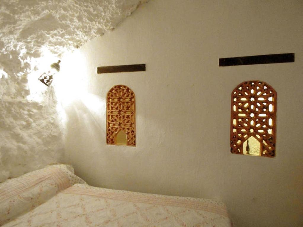 Posteľ alebo postele v izbe v ubytovaní La Constanza Casa Cueva