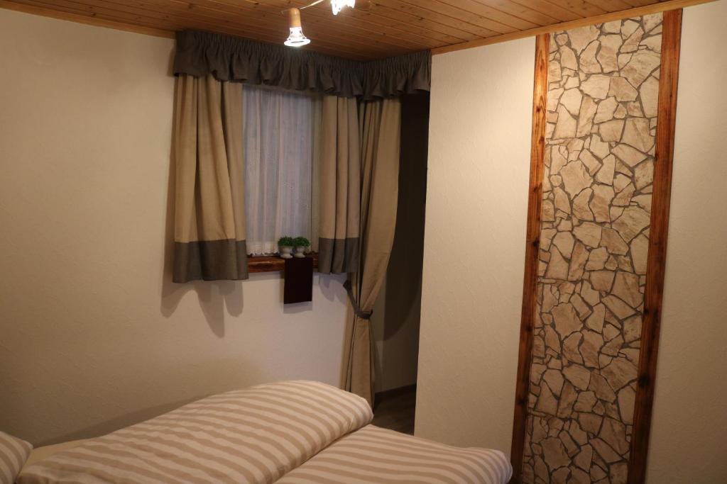 Postel nebo postele na pokoji v ubytování Ferienhaus Höll