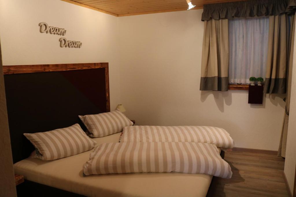 Postel nebo postele na pokoji v ubytování Ferienhaus Höll