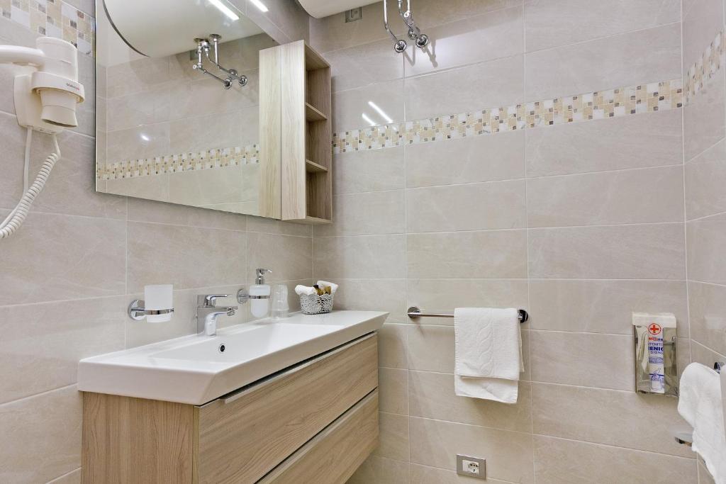Koupelna v ubytování Residence Dei Due Porti