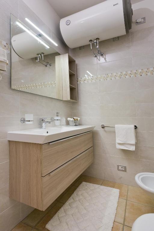 Koupelna v ubytování Residence Dei Due Porti